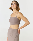 Elevate your everyday style with the Isla Cropped Tank by AOCO. Featuring a flattering fit and breathable fabric, it's the perfect warm weather staple.