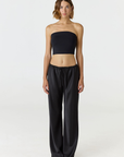 Elevate your warm-weather wardrobe with the Edie Bandeau Top from AOCO. This chic strapless design offers a flattering fit and endless style possibilities.