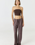 Elevate your warm-weather wardrobe with the Edie Bandeau Top from AOCO. This chic strapless design offers a flattering fit and endless style possibilities.