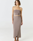 Elevate your warm-weather wardrobe with the Edie Bandeau Top from AOCO. This chic strapless design offers a flattering fit and endless style possibilities.