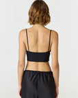 Elevate your everyday style with the Isla Cropped Tank by AOCO. Featuring a flattering fit and breathable fabric, it's the perfect warm weather staple.