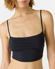 Elevate your everyday style with the Isla Cropped Tank by AOCO. Featuring a flattering fit and breathable fabric, it's the perfect warm weather staple.