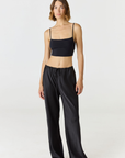 Elevate your everyday style with the Isla Cropped Tank by AOCO. Featuring a flattering fit and breathable fabric, it's the perfect warm weather staple.