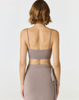 Elevate your everyday style with the Isla Cropped Tank by AOCO. Featuring a flattering fit and breathable fabric, it's the perfect warm weather staple.